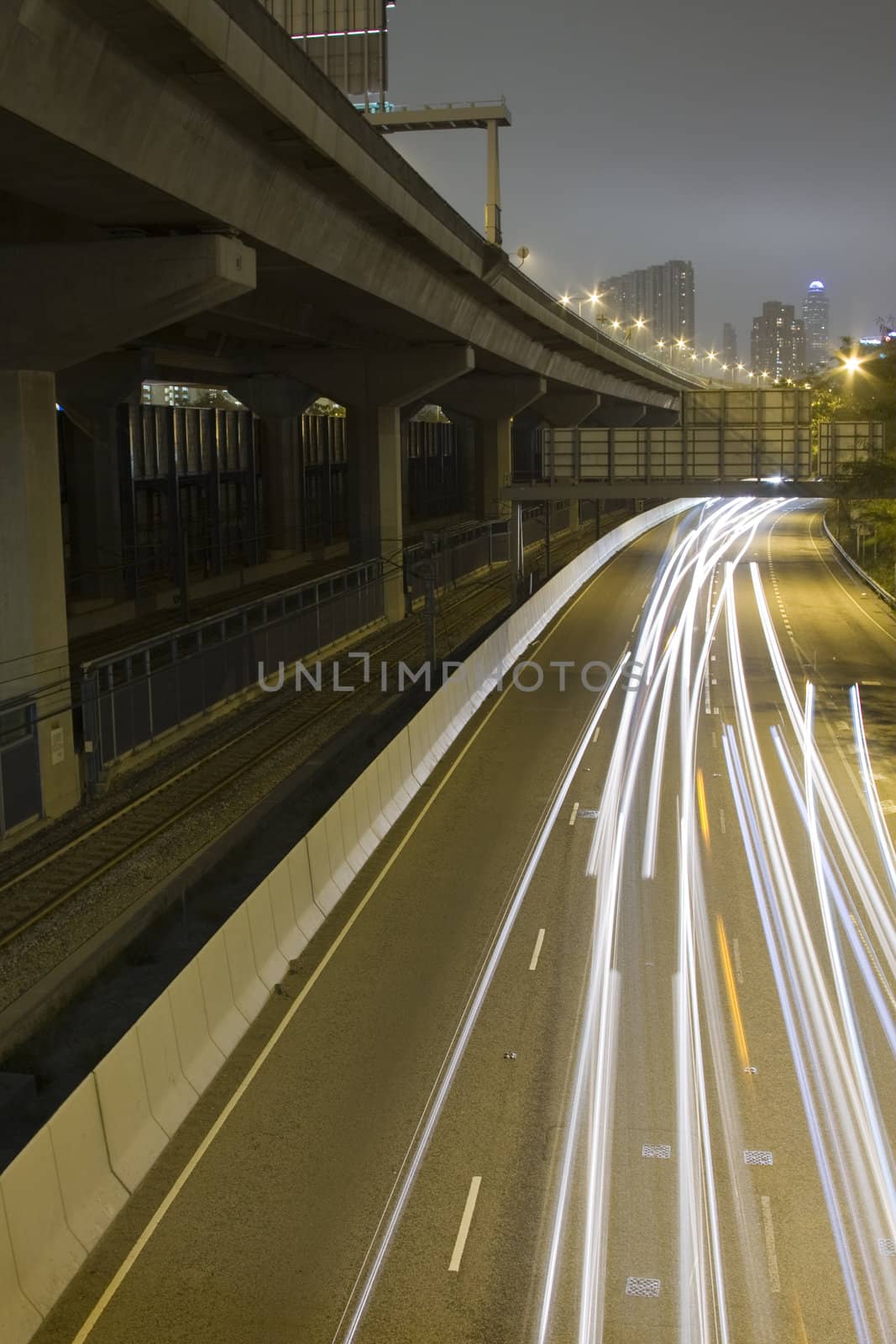 Highway with many car at night by cozyta