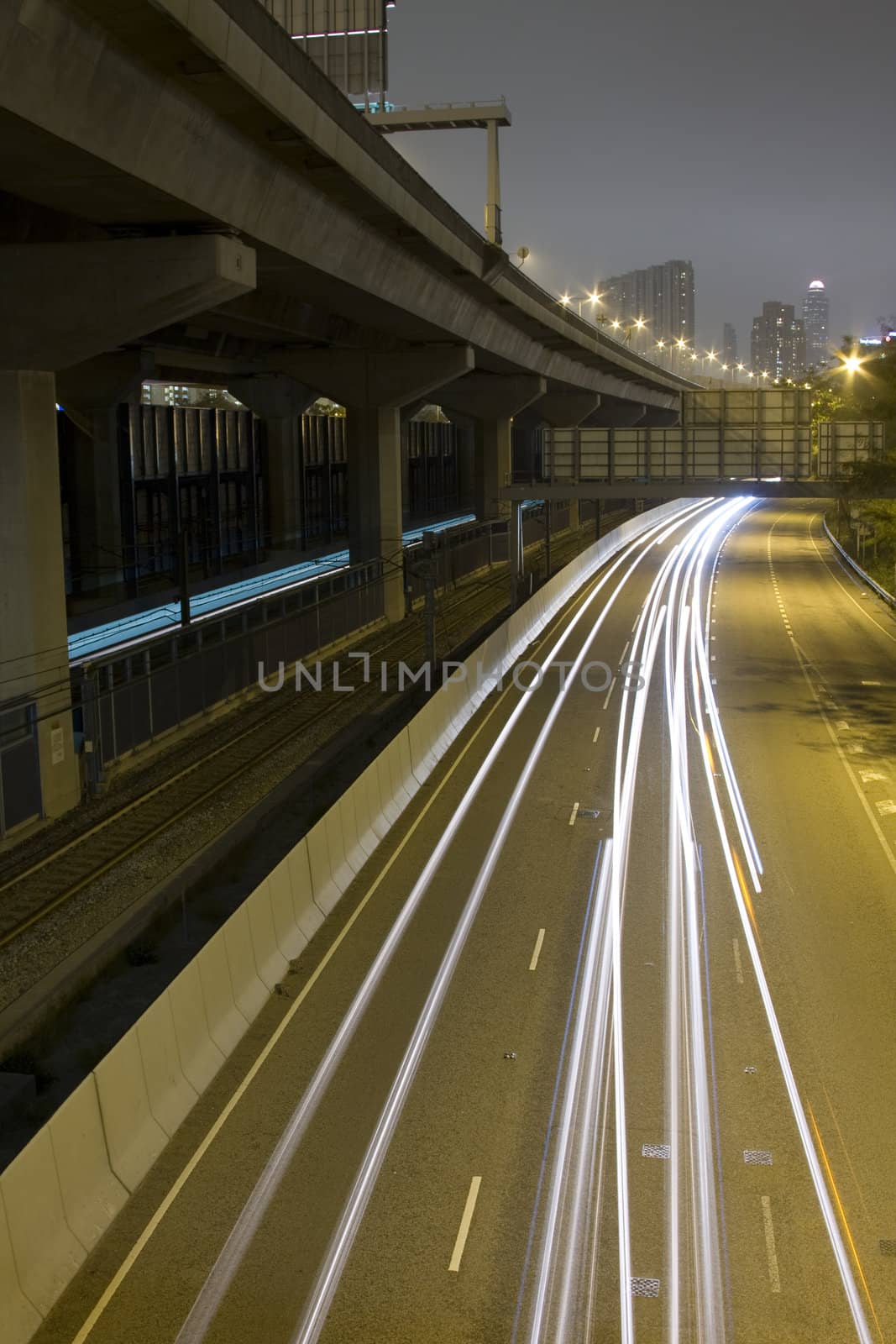 Highway with many car at night by cozyta