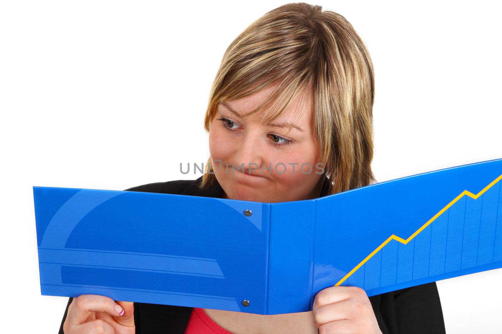 Young woman looking shocked at statement of account. Shot in studio.