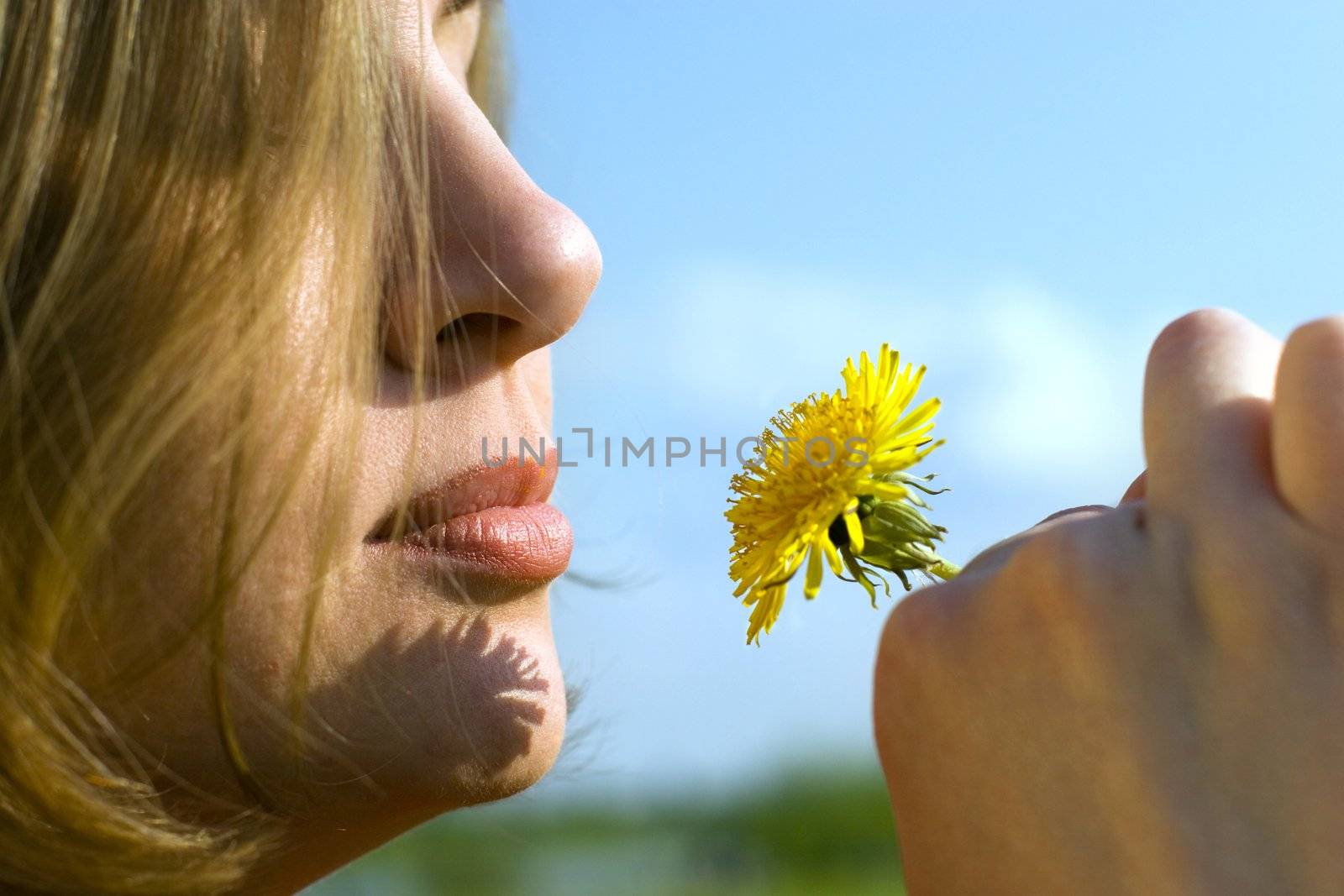 Potrait of woman with a flower