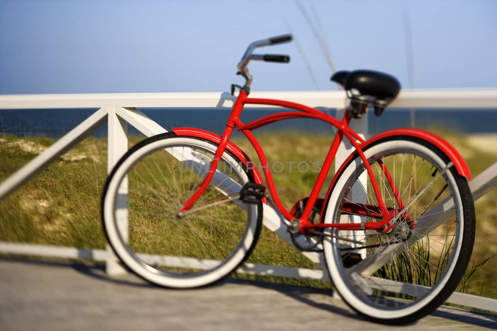 Bicycle at beach. by iofoto