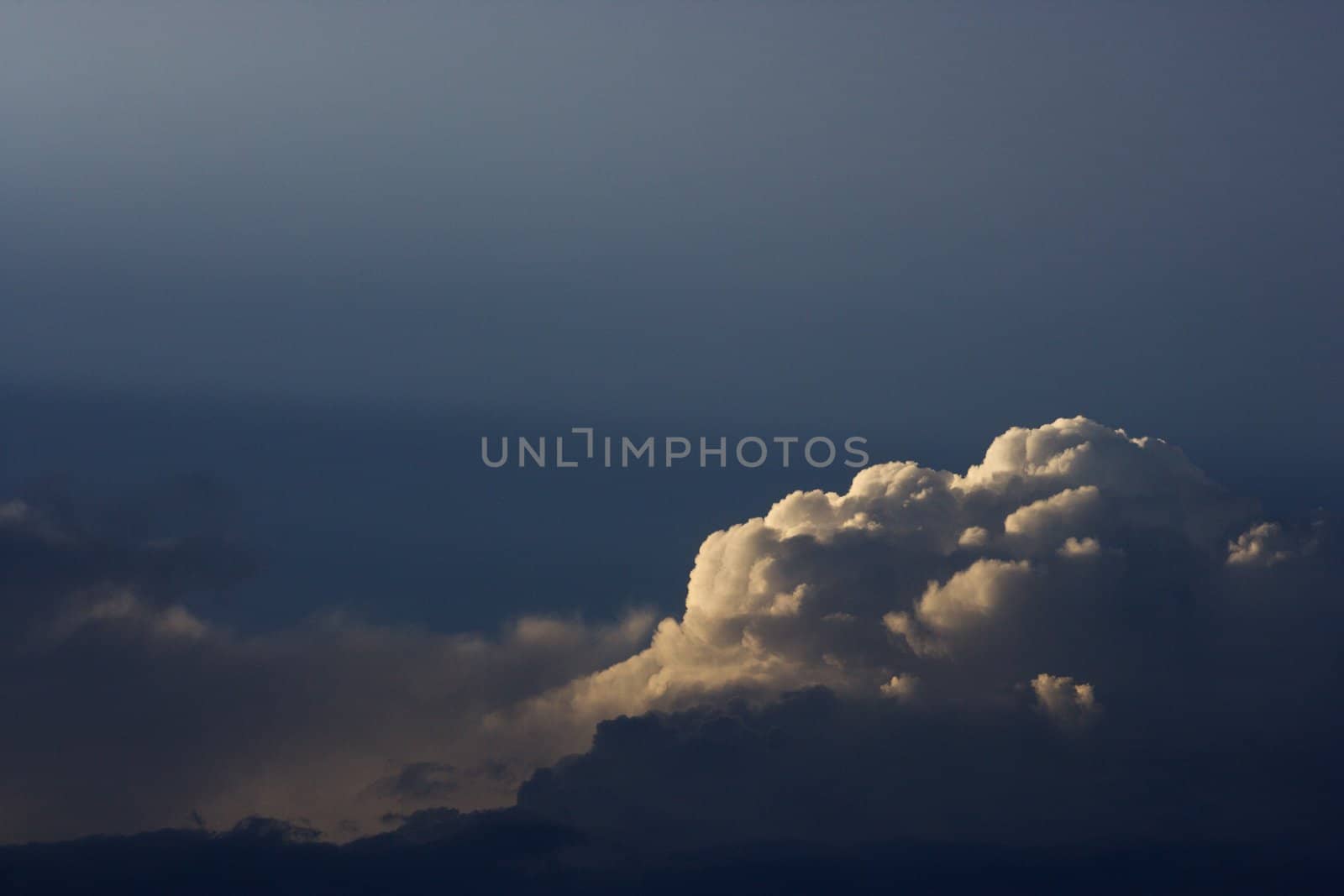Sun peeking through clouds. by iofoto