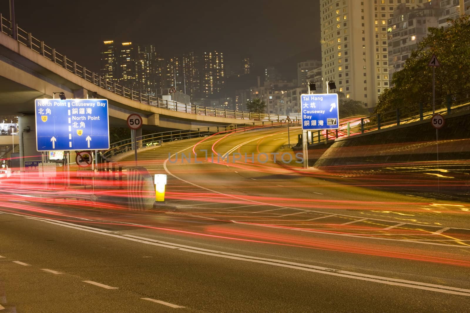 It is a shot of hong kong traffic night