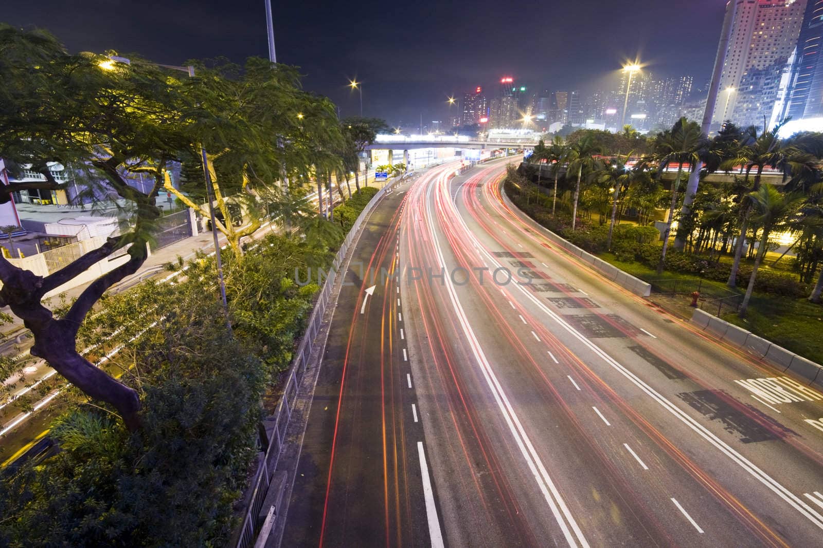 It is a shot of hong kong traffic night