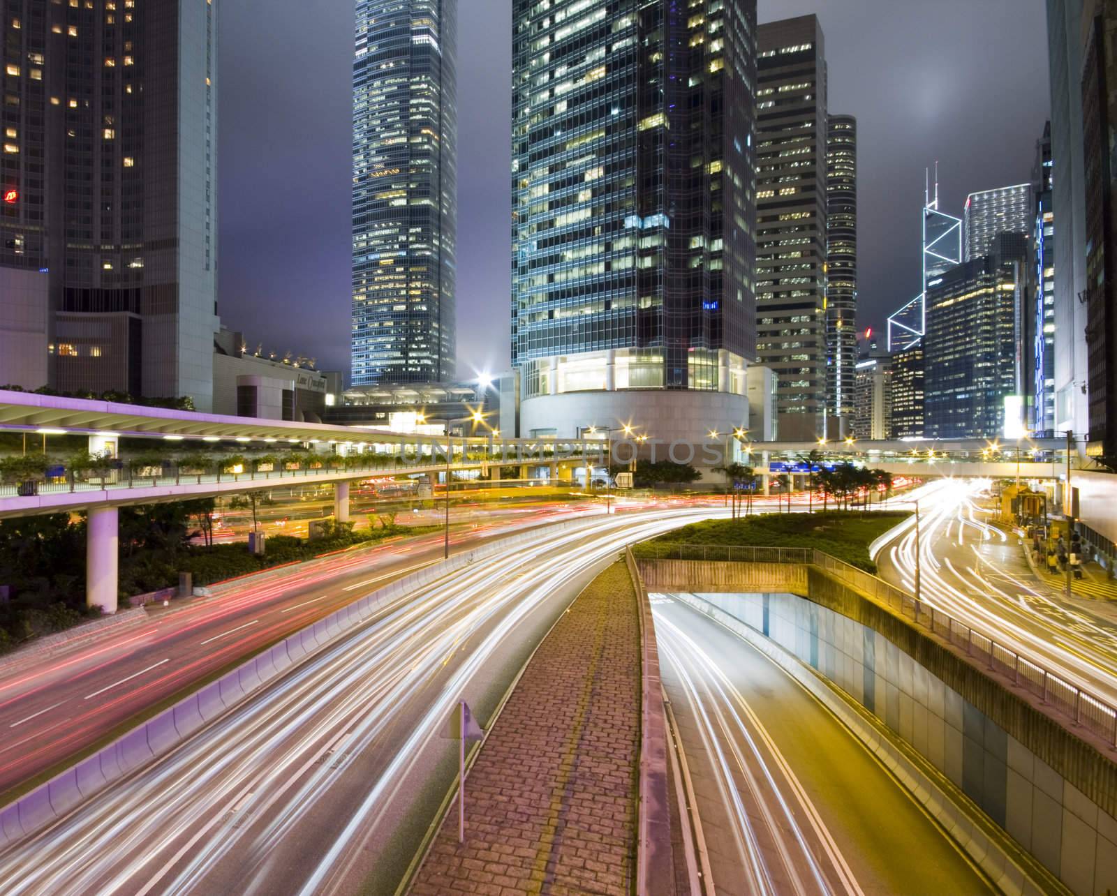 Hong Kong at night with highrise buildings
