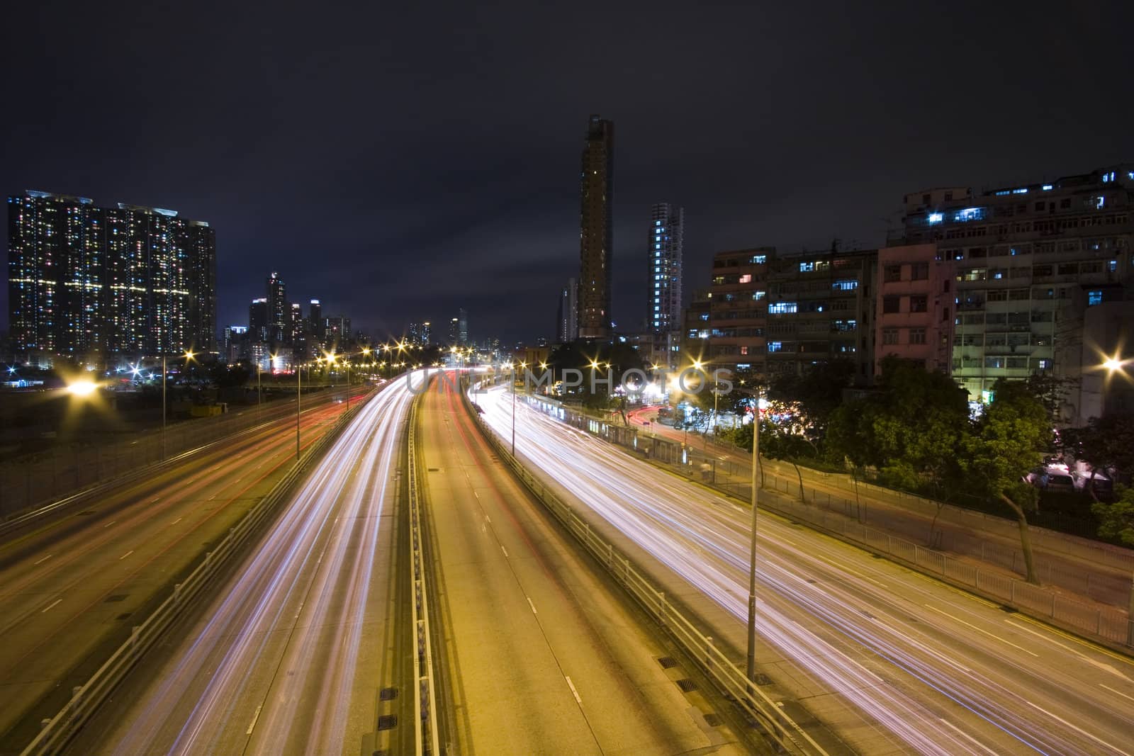 It is a shot of hong kong traffic night