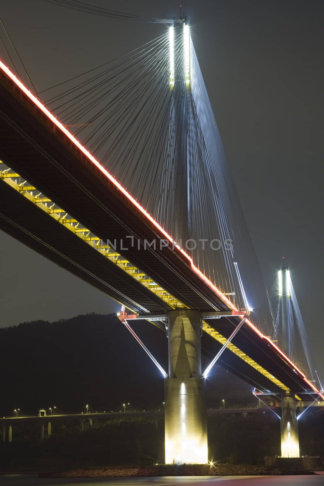 It is beautiful night scenes of Bridge in Hong Kong.