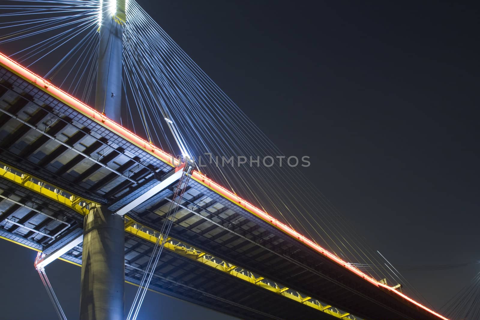 It is beautiful night scenes of Bridge in Hong Kong.