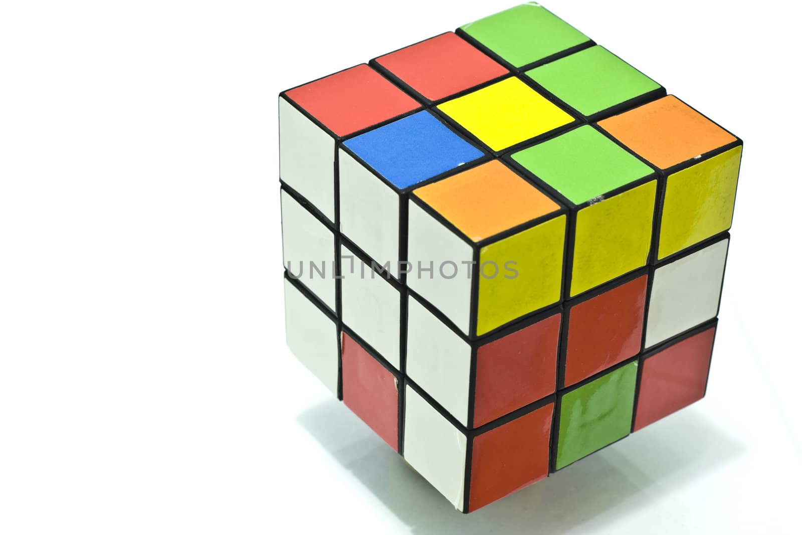 It is a Rubik's cube over white background