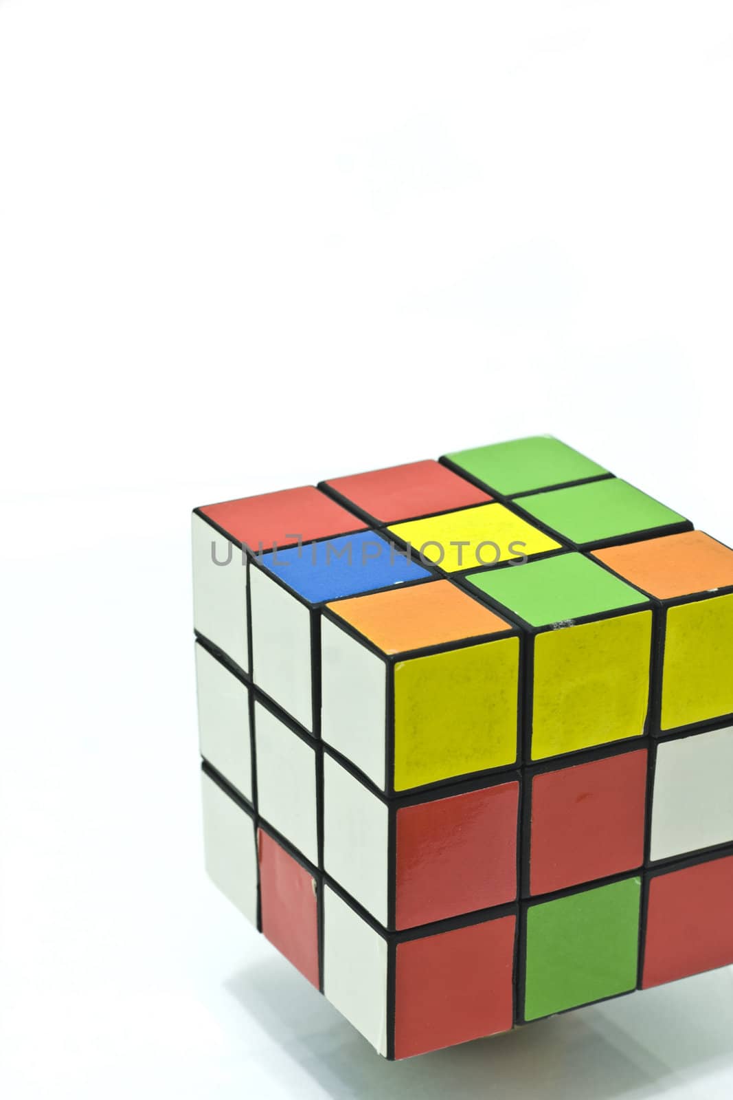 It is a Rubik's cube over white background