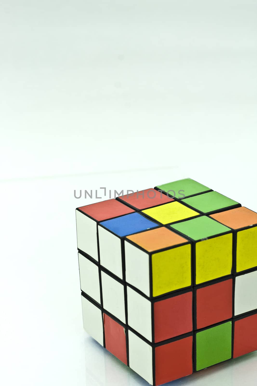 It is a Rubik's cube over white background