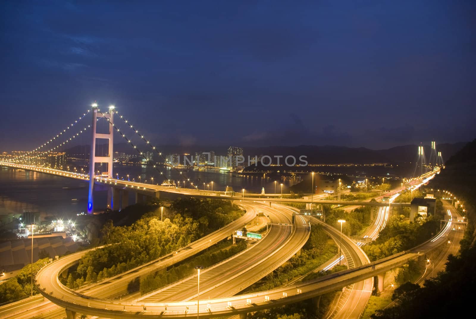 A magical evening of Hong Kong Tsing Ma Bridge .       