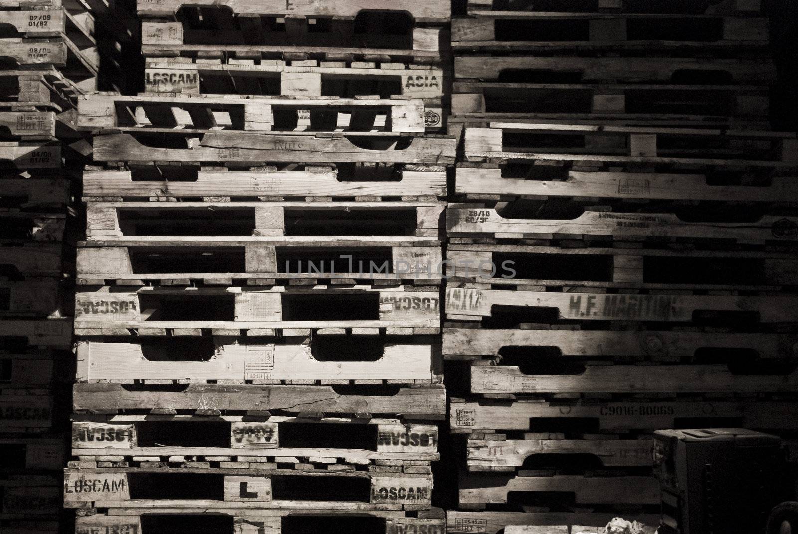 Piles of wooden pallets in balck and white.
