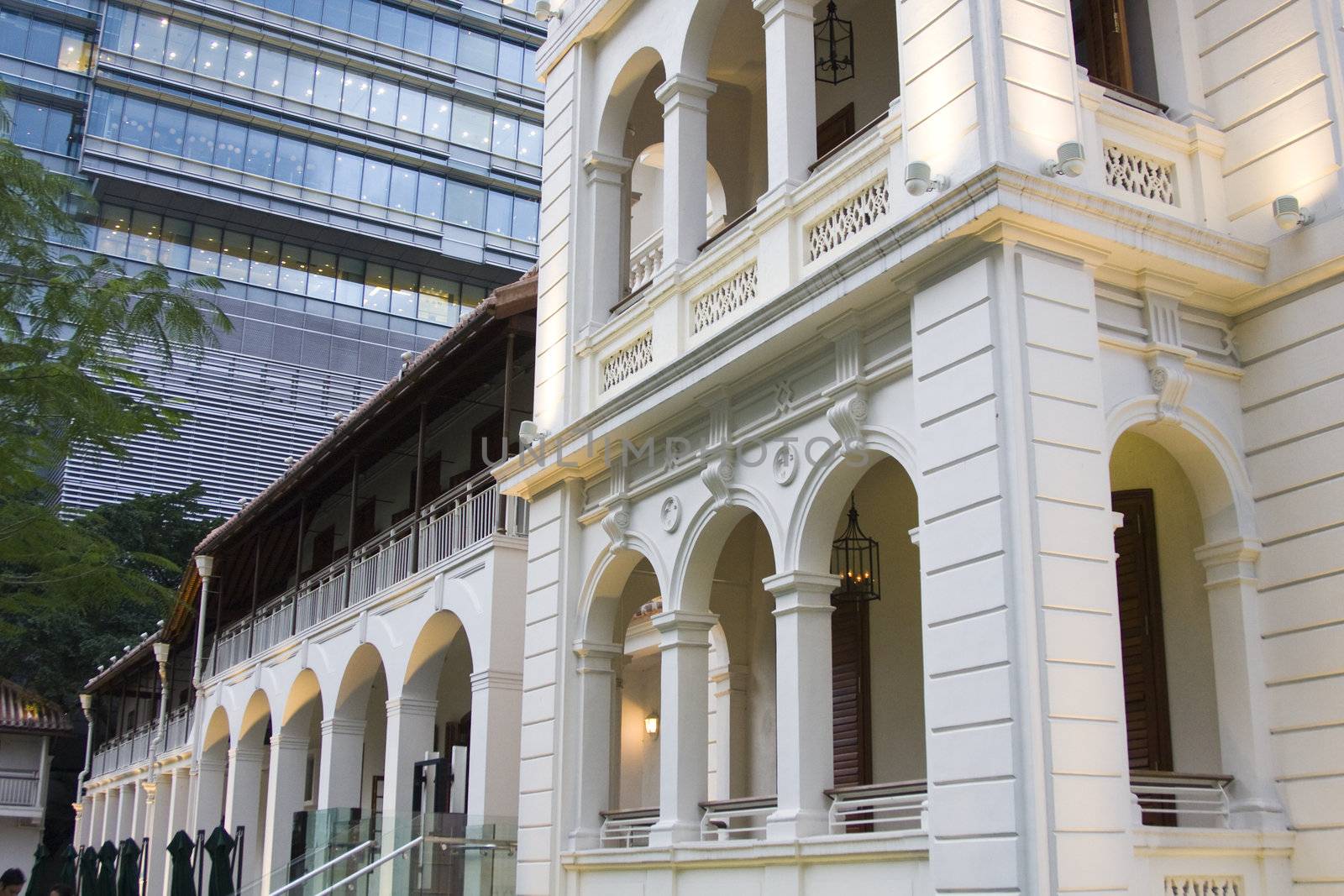 it is a old england style in the front of a modern building.