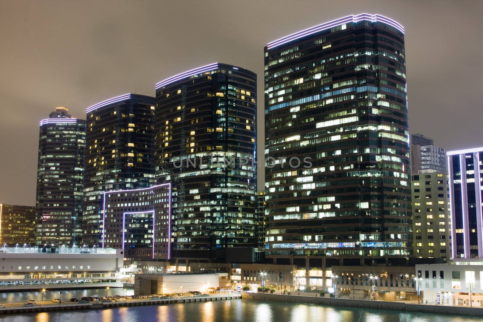 Hong Kong at night with highrise buildings
