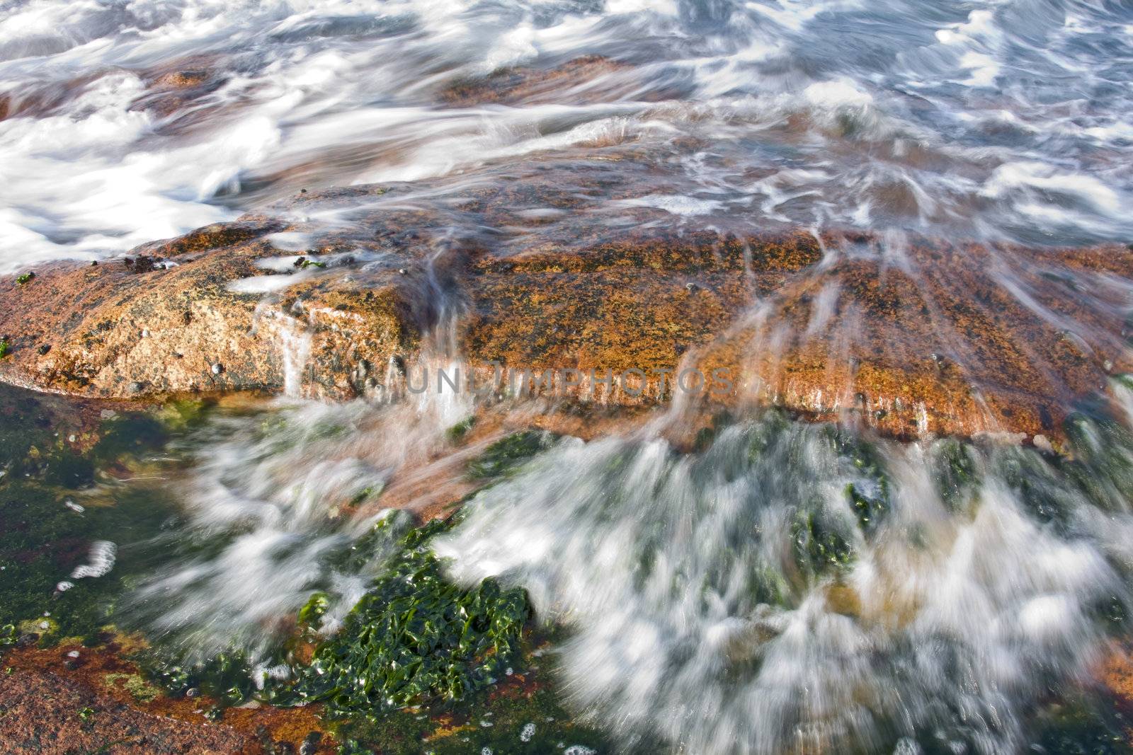 Long exposure of rock coast background