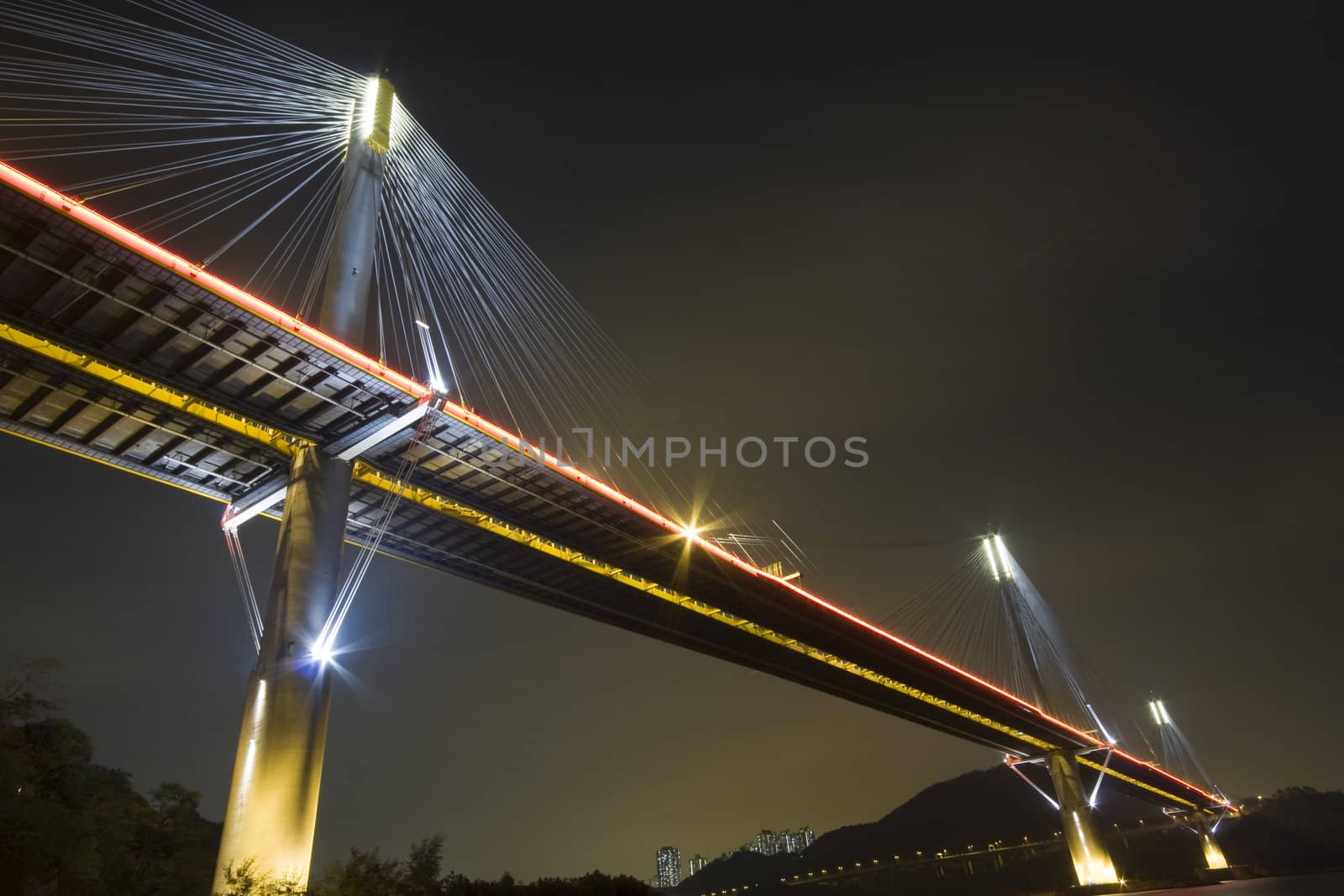 It is beautiful night scenes of Bridge in Hong Kong.