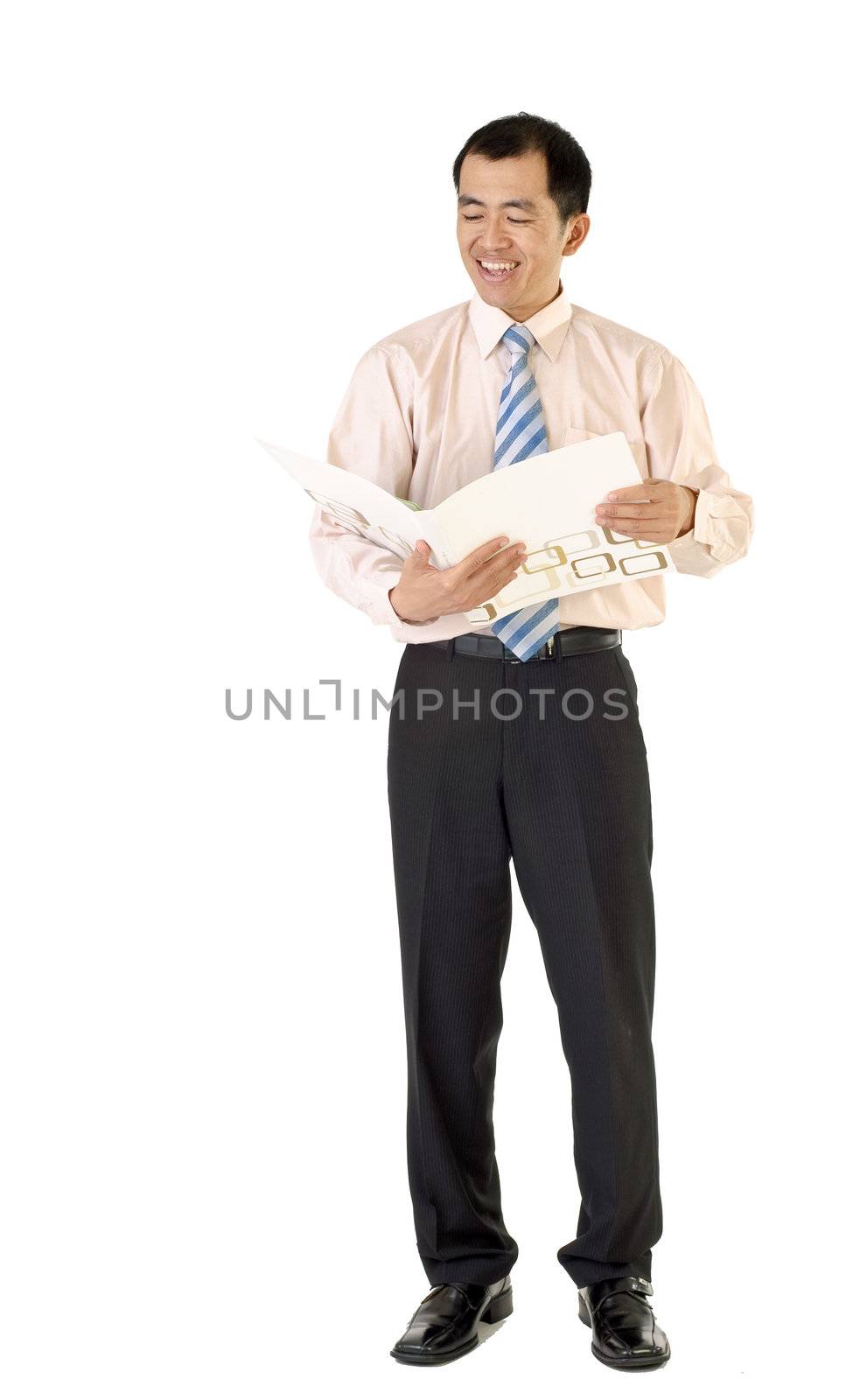Businessman read report with smiling face on white background.
