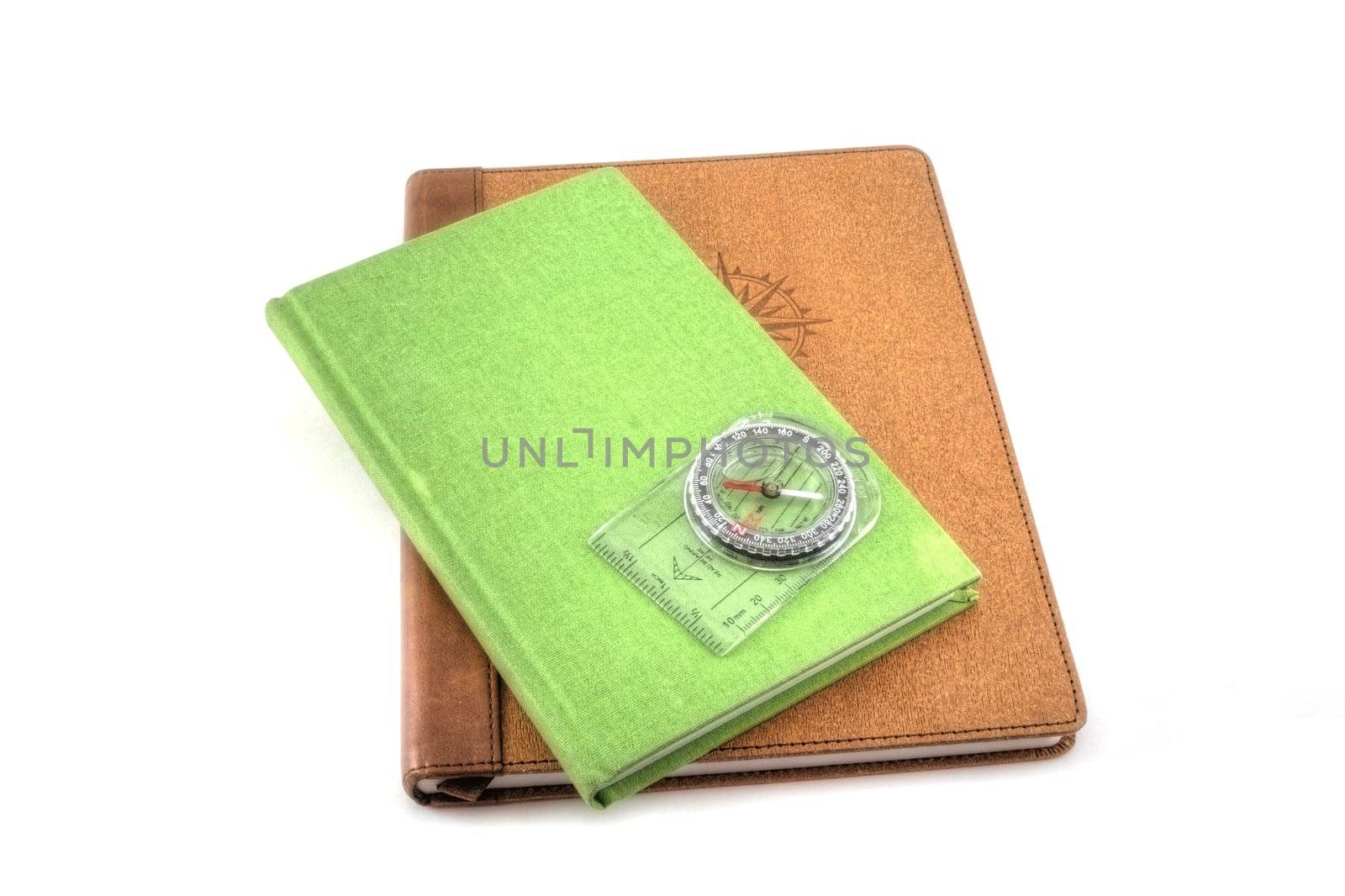 A green and brown travel journal isolated on white.