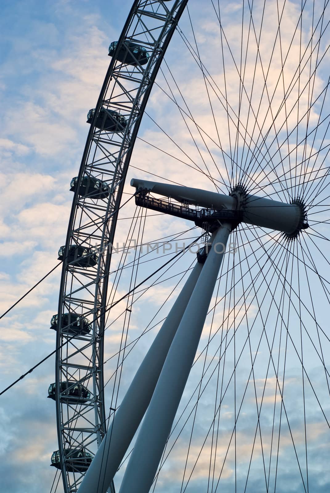 London Eye glowing pink at dusk