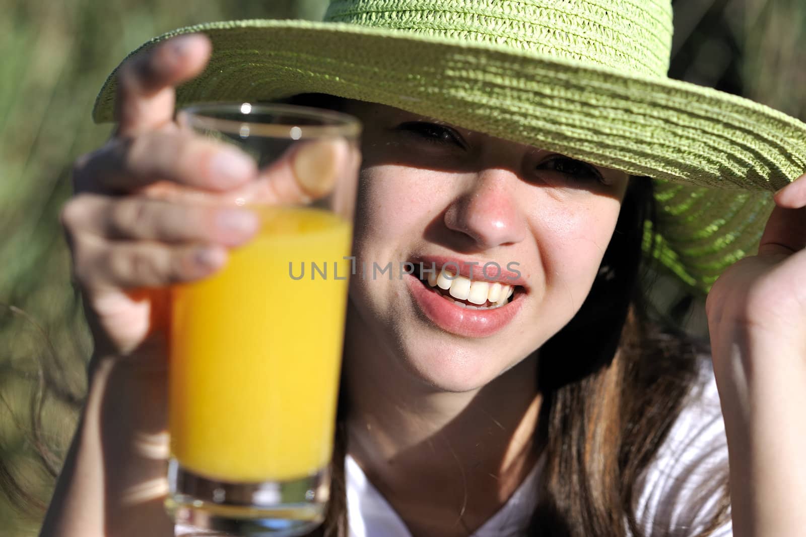 Woman drinking her orange juice