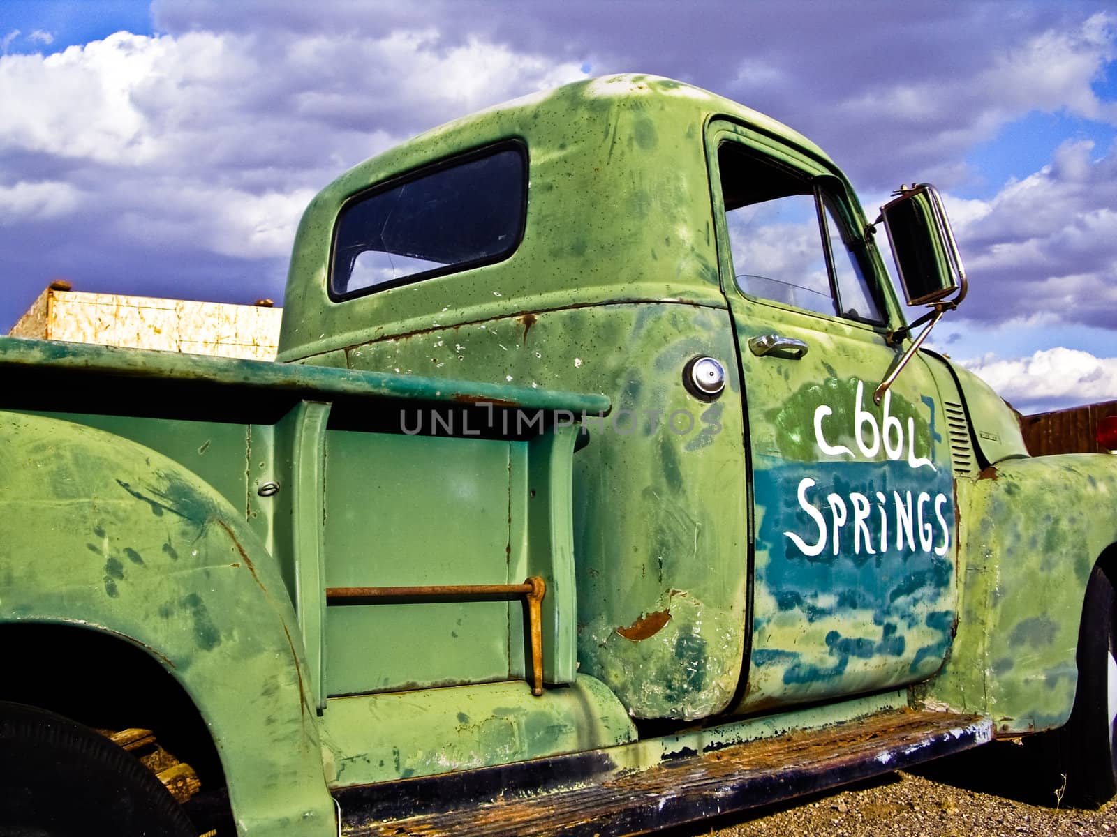 Old green pick up truck  on Route 66 USA