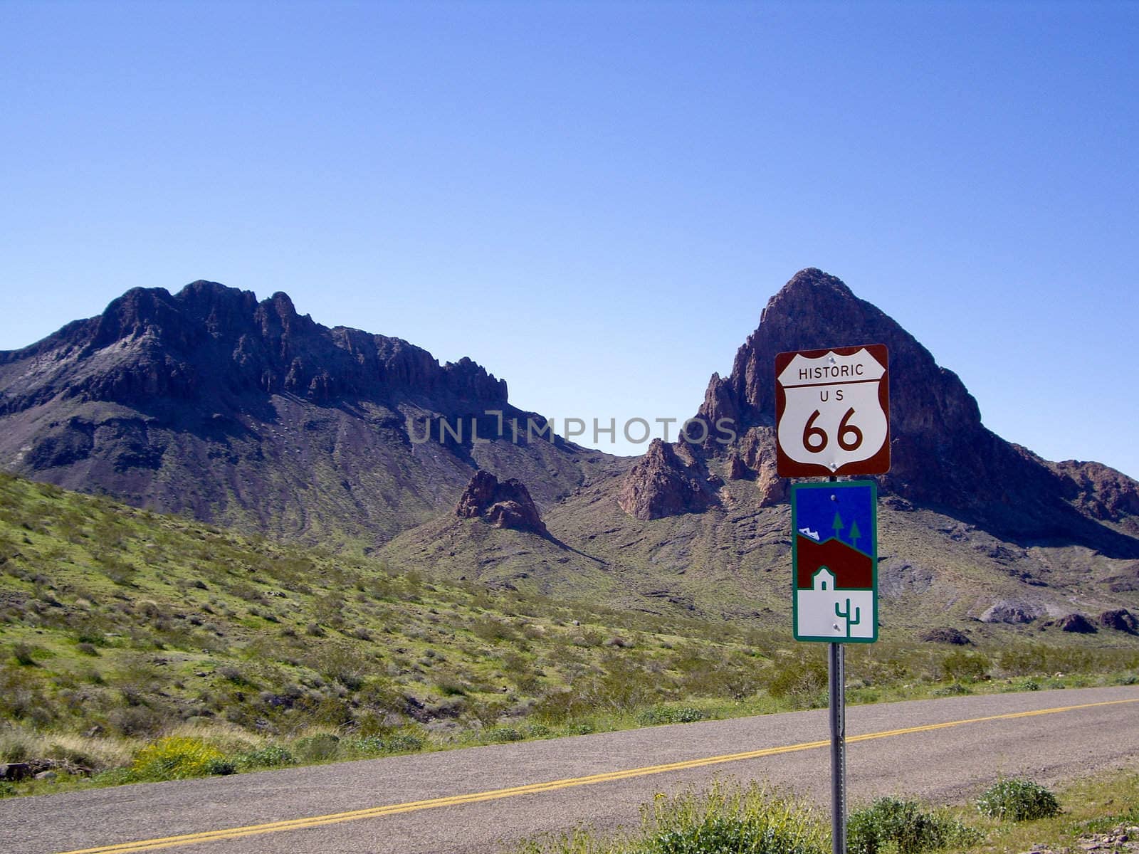 Historic Route 66 sign on desert highway Arizona USA