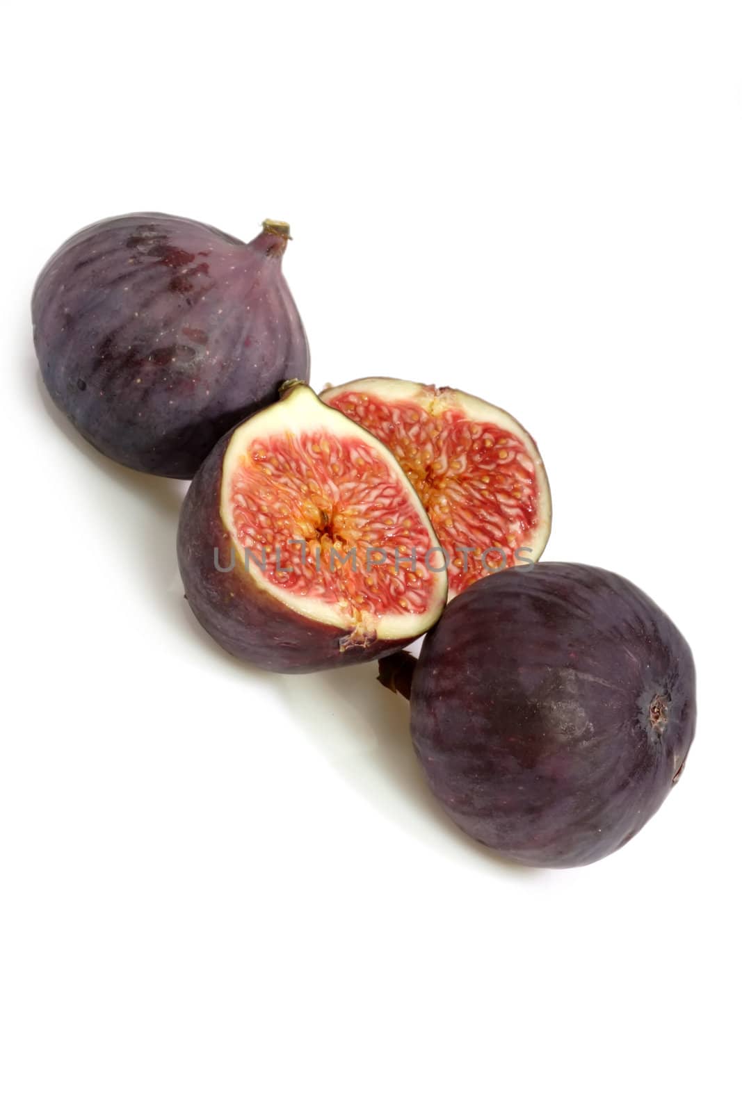 Purple figs on bright background