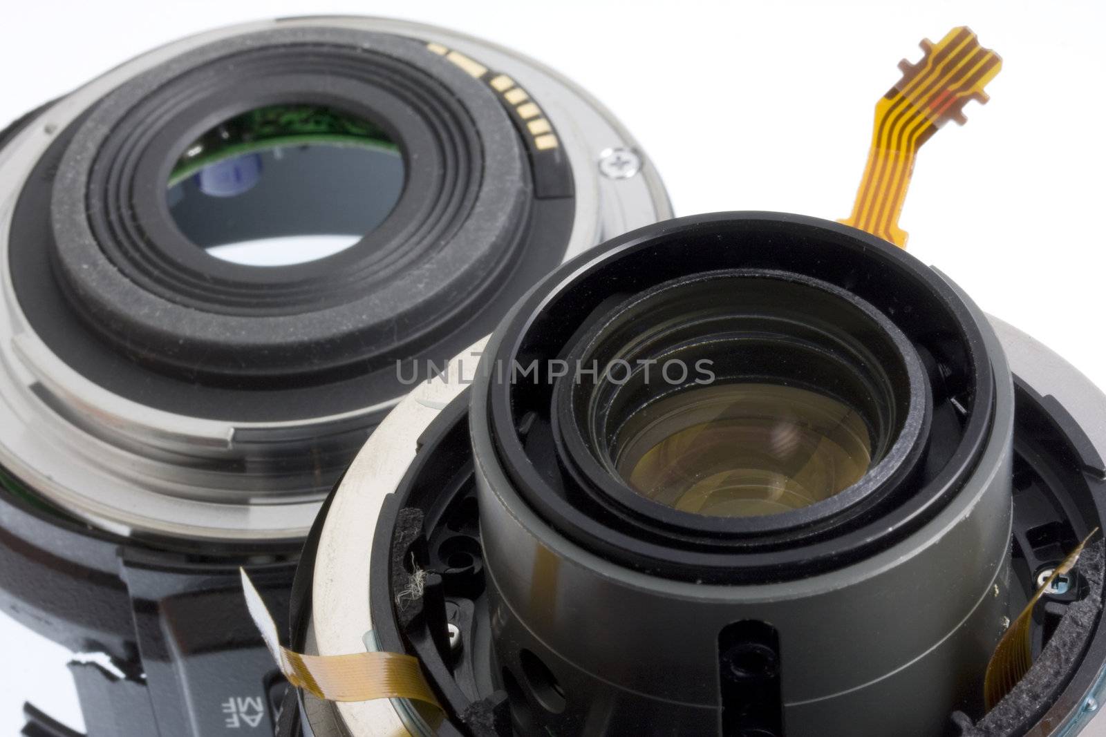 Broken autofocus 60mm lens - two parts with visible eletronic circuits