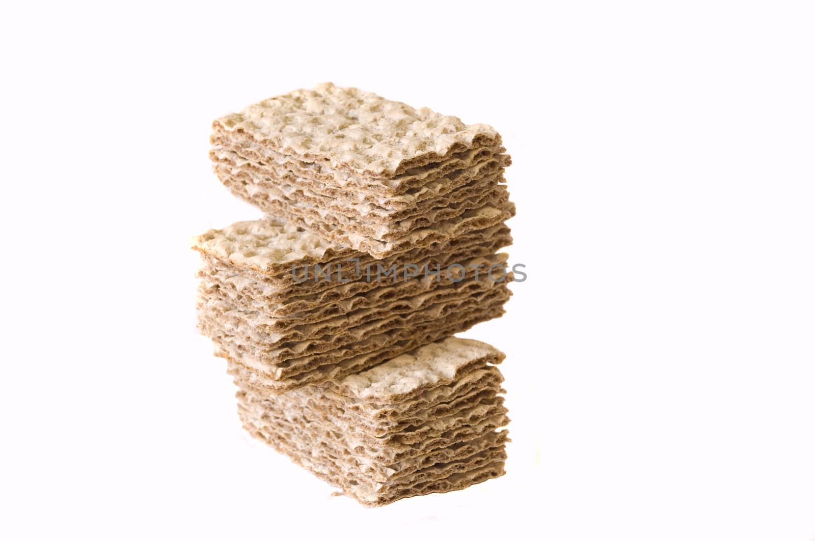 Stack of crackers isolated on a white background