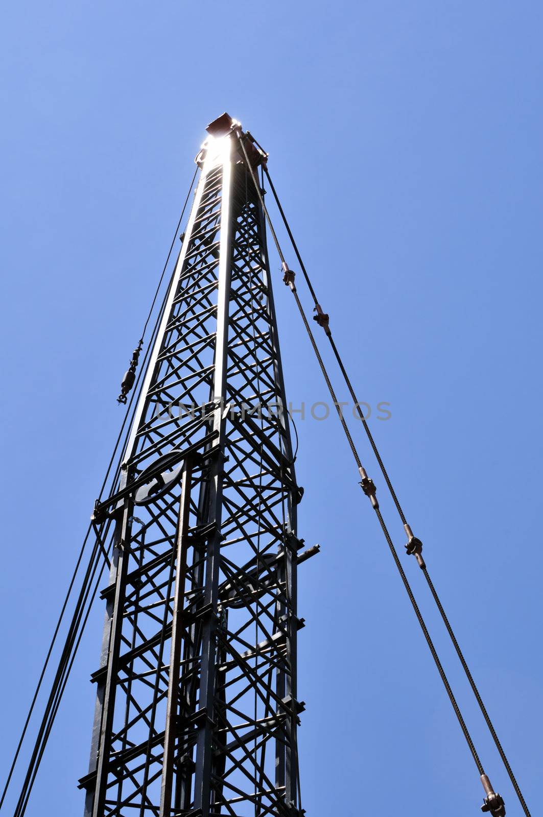 Detail of a crane arm against the sky