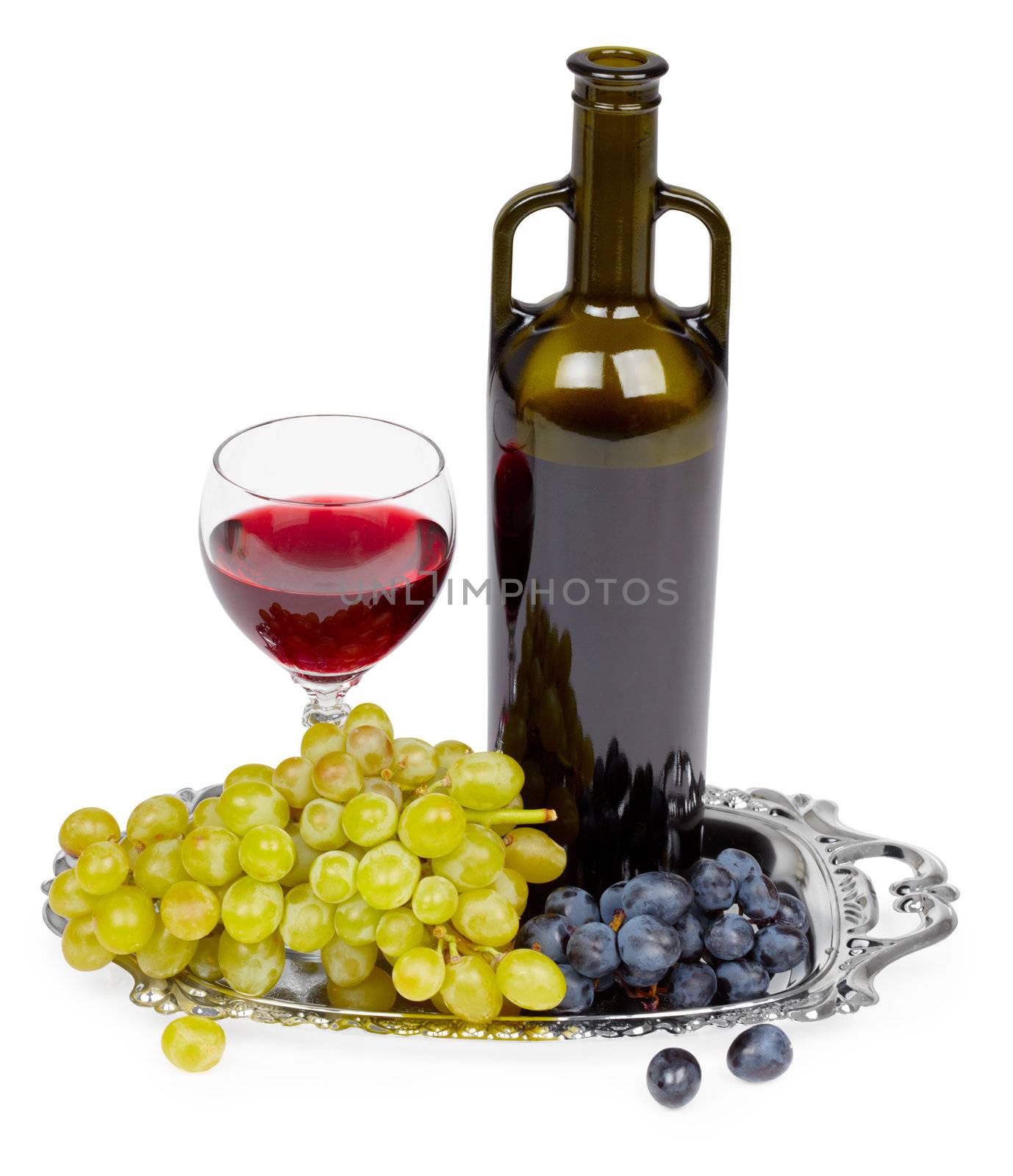 A bottle of red wine, glass and grapes on a white background - still life