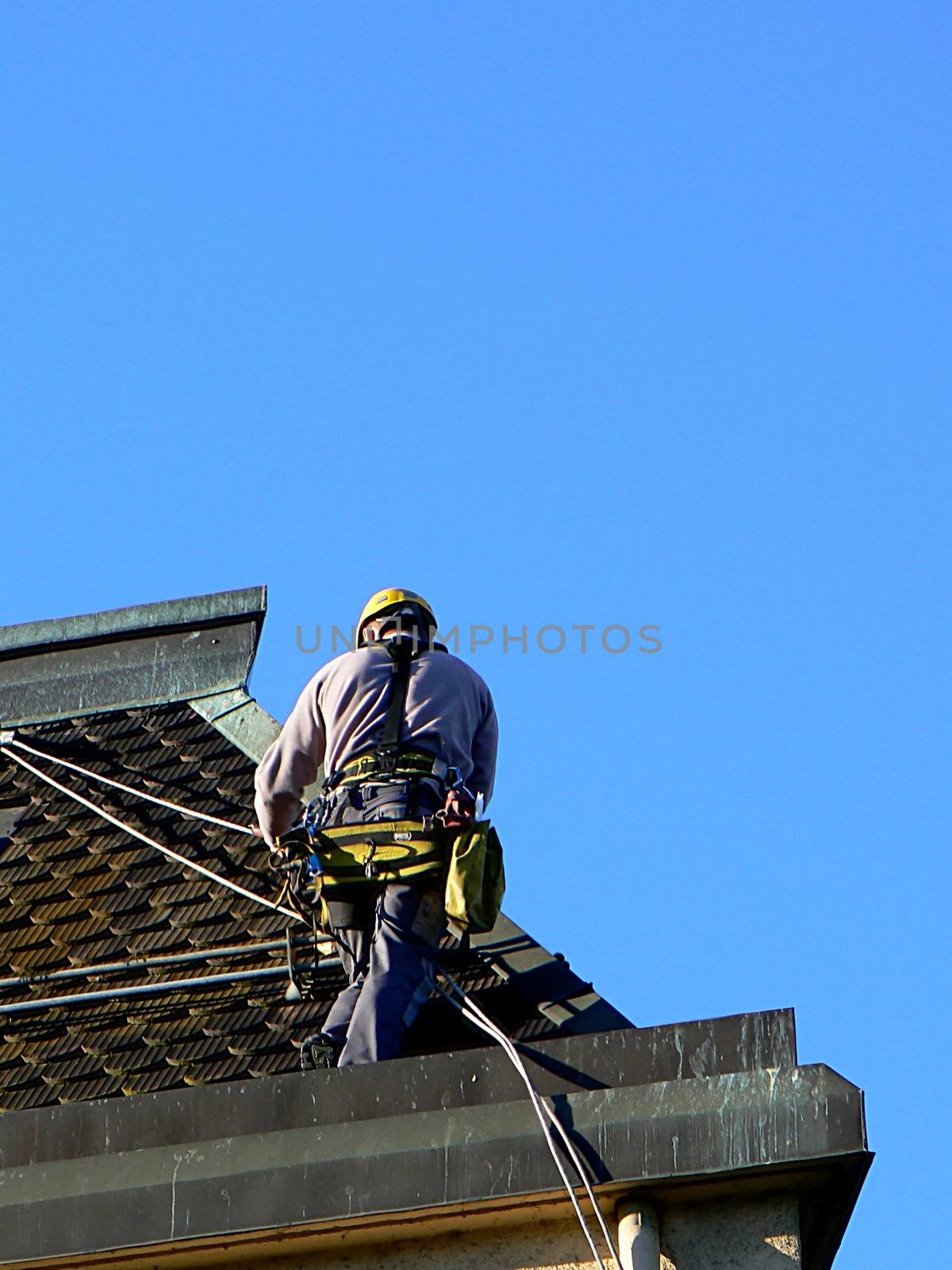 A man on a roof