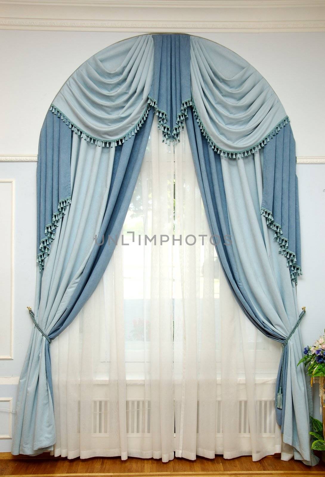 light blue rippled textile curtain