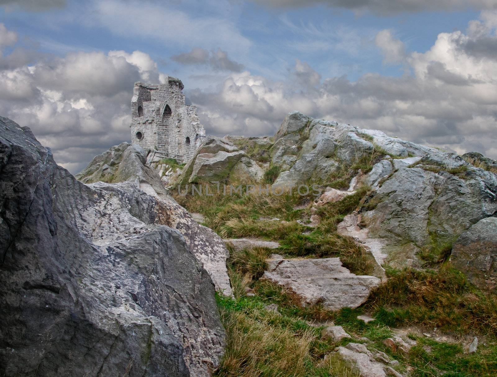 Mow Cop castle stands on top of a hill at the edge of the Cheshire plain in England.