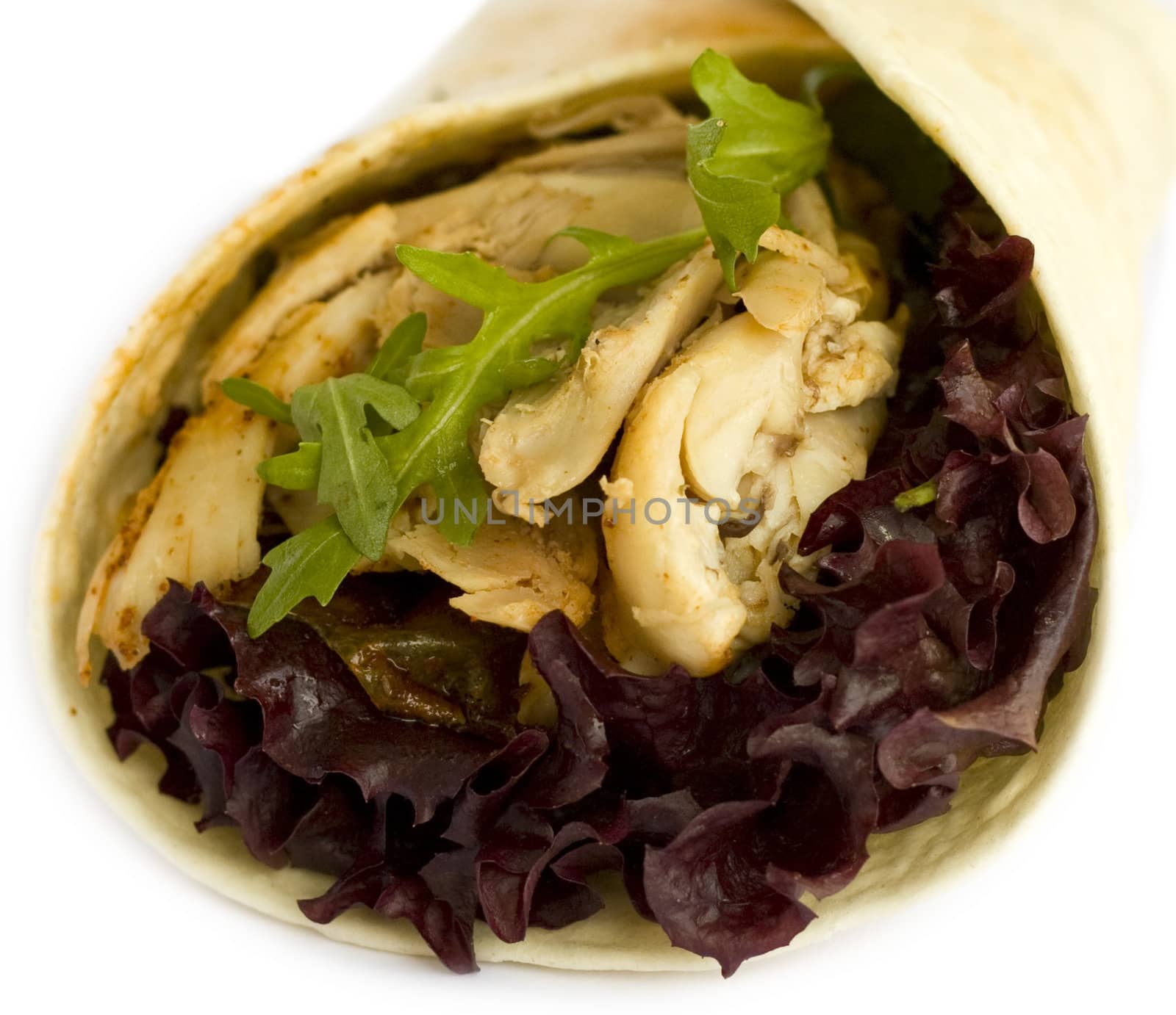 Healthy chicken and lettuce wrap on white background.