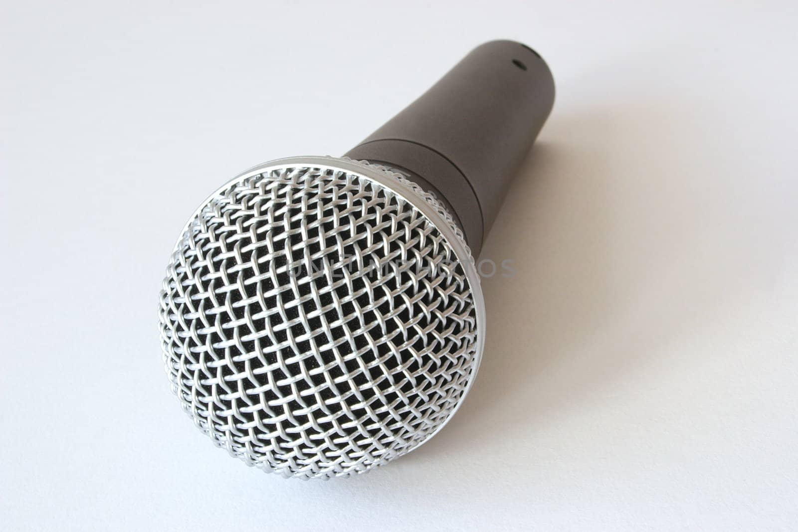 musicians microphone against a light background