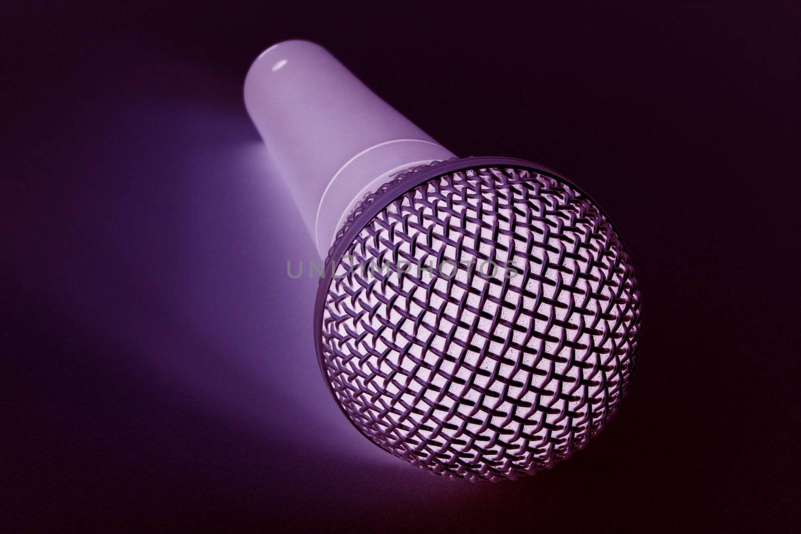 blue coloured mic over a black background