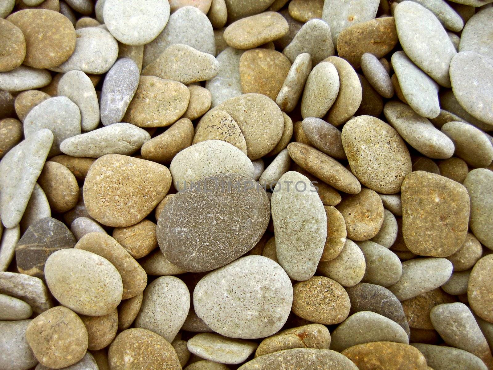 Sand stone background on the beach and sea
