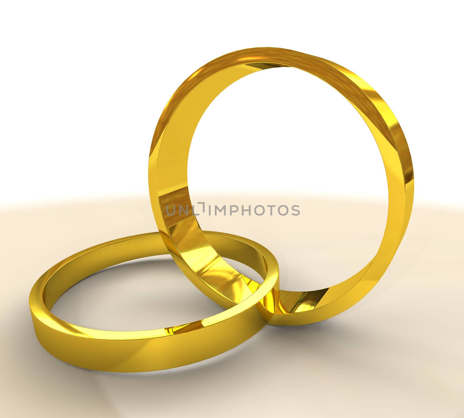 Pair of golden wedding bands or rings linked together representing marriage