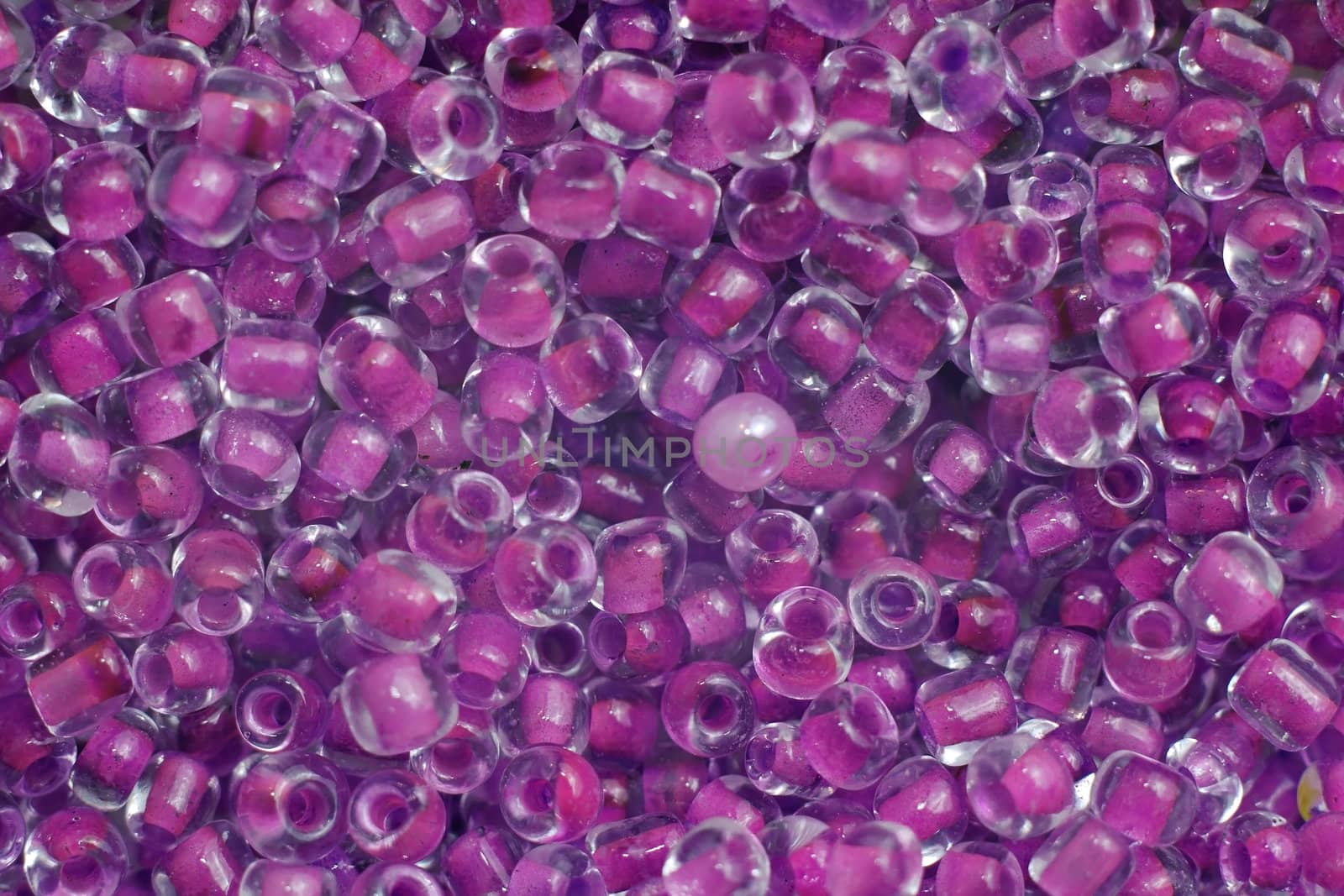 Group of purple plastic beads