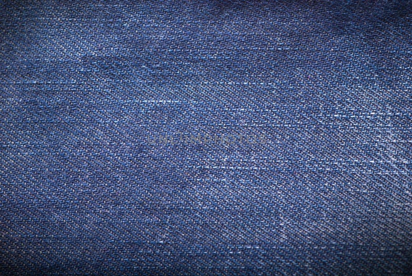 Dark blue denim background or texture