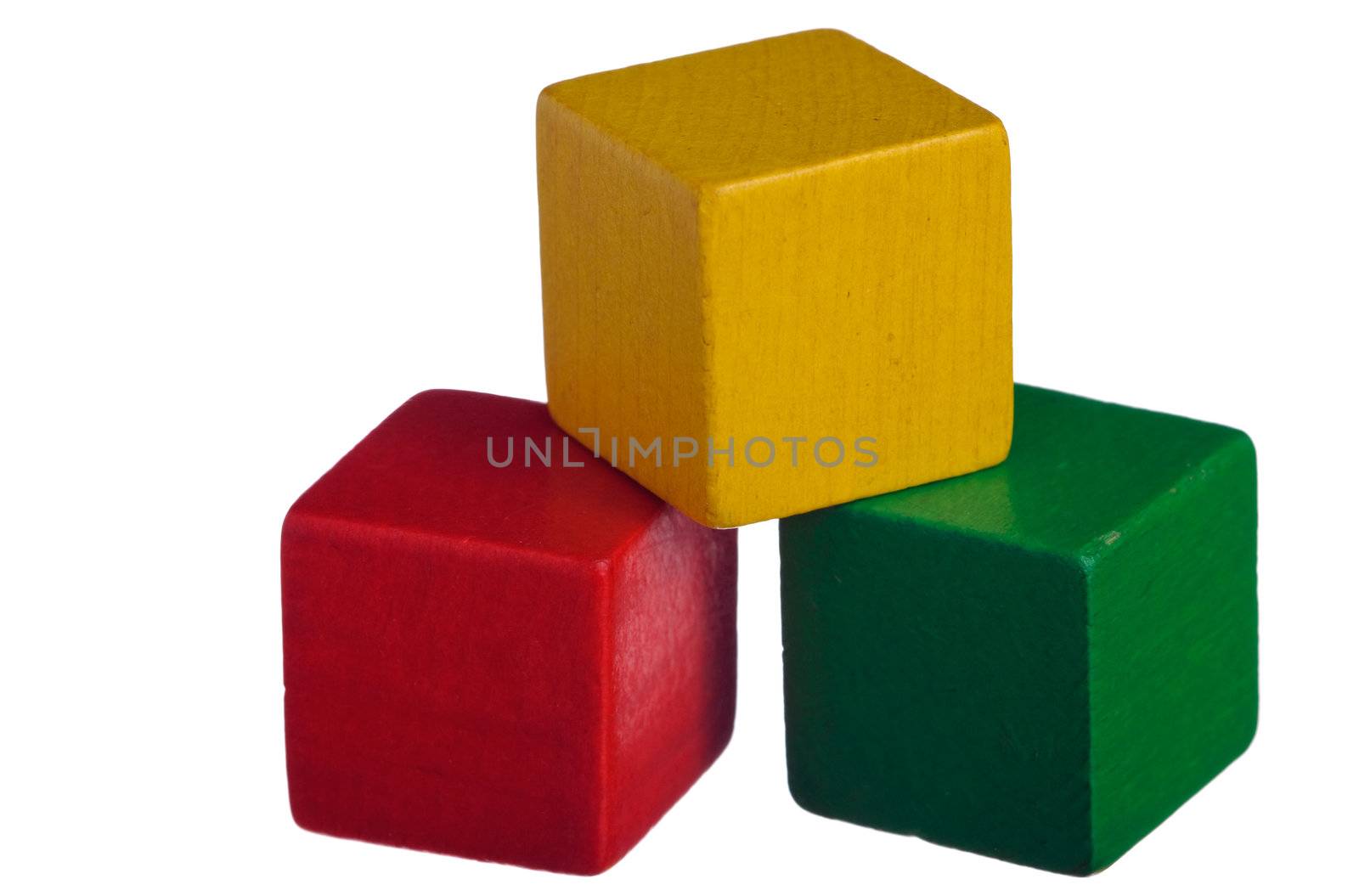 Colorful wooden childen's building blocks isolated on white background