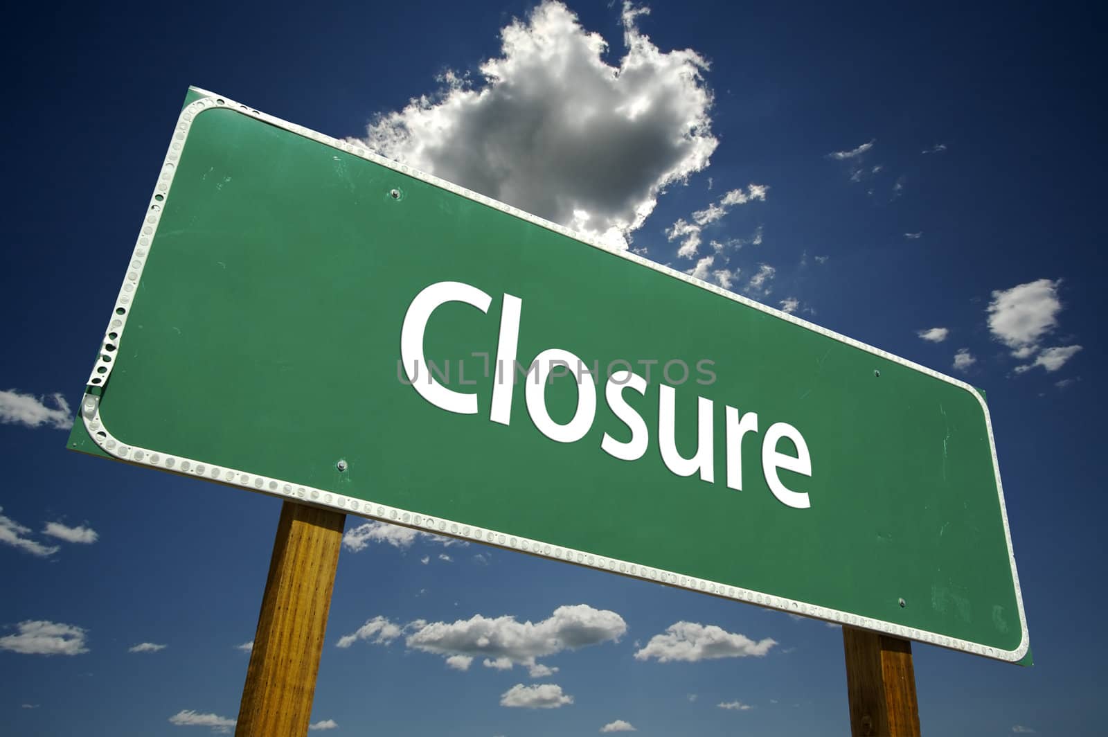 Closure Road Sign with dramatic clouds and sky.