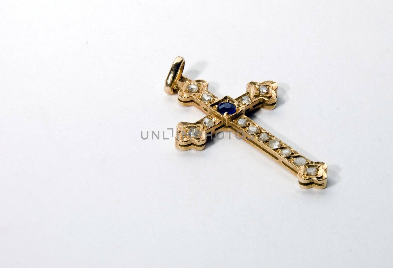 Antique 24ct gold crucifix pendant with inset sapphire and diamonds