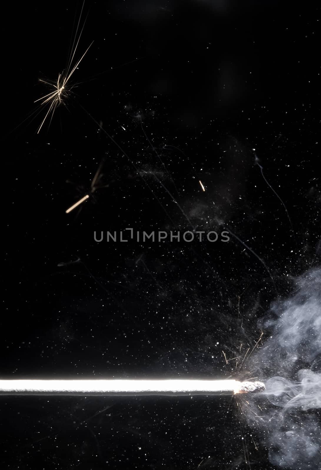 Detail image of a pyrotechnic fuse burning up