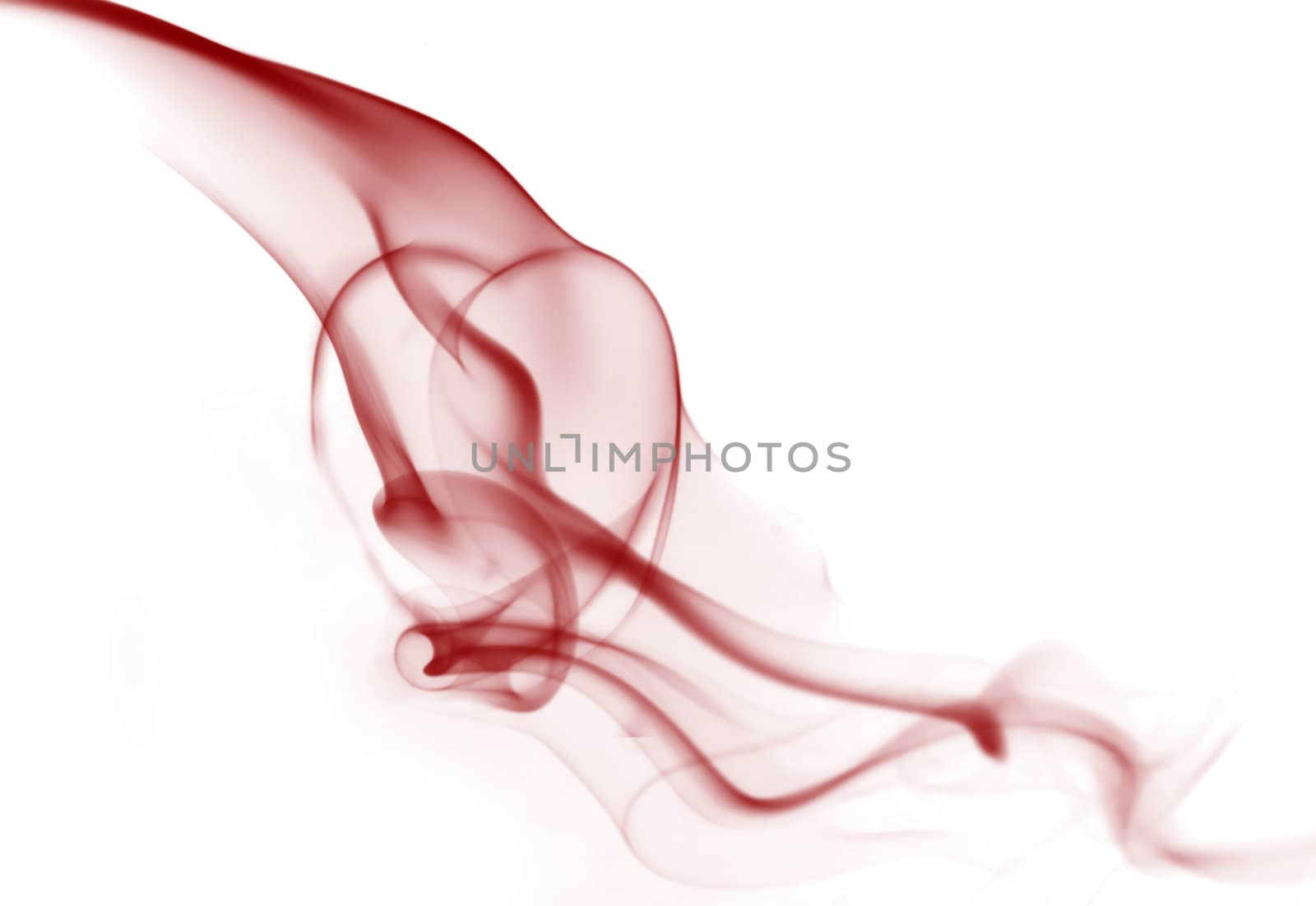 Abstract heart image formed by smoke trails frozen with off camera flash