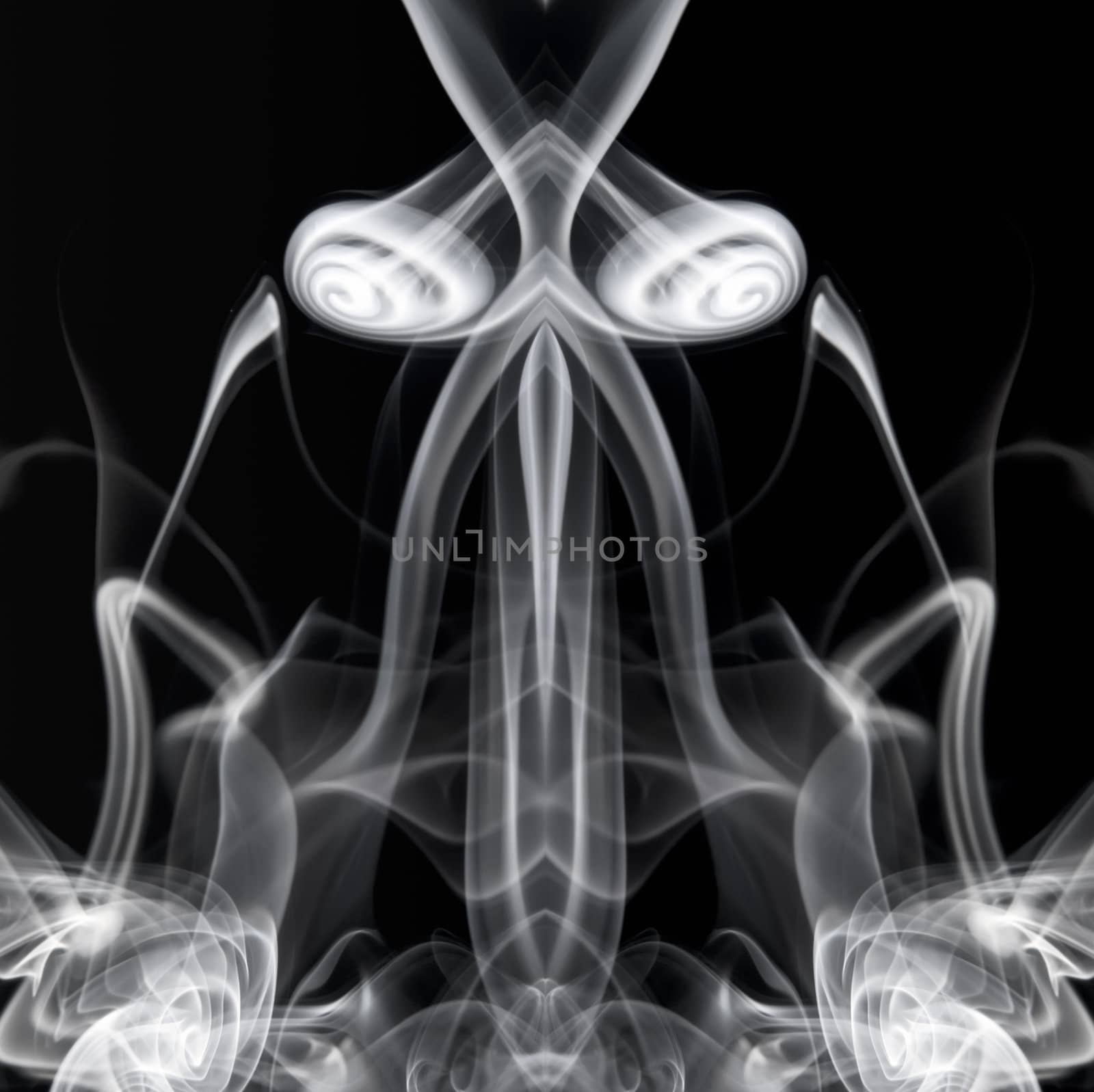 Abstract image of smoke trails frozen with off camera flash