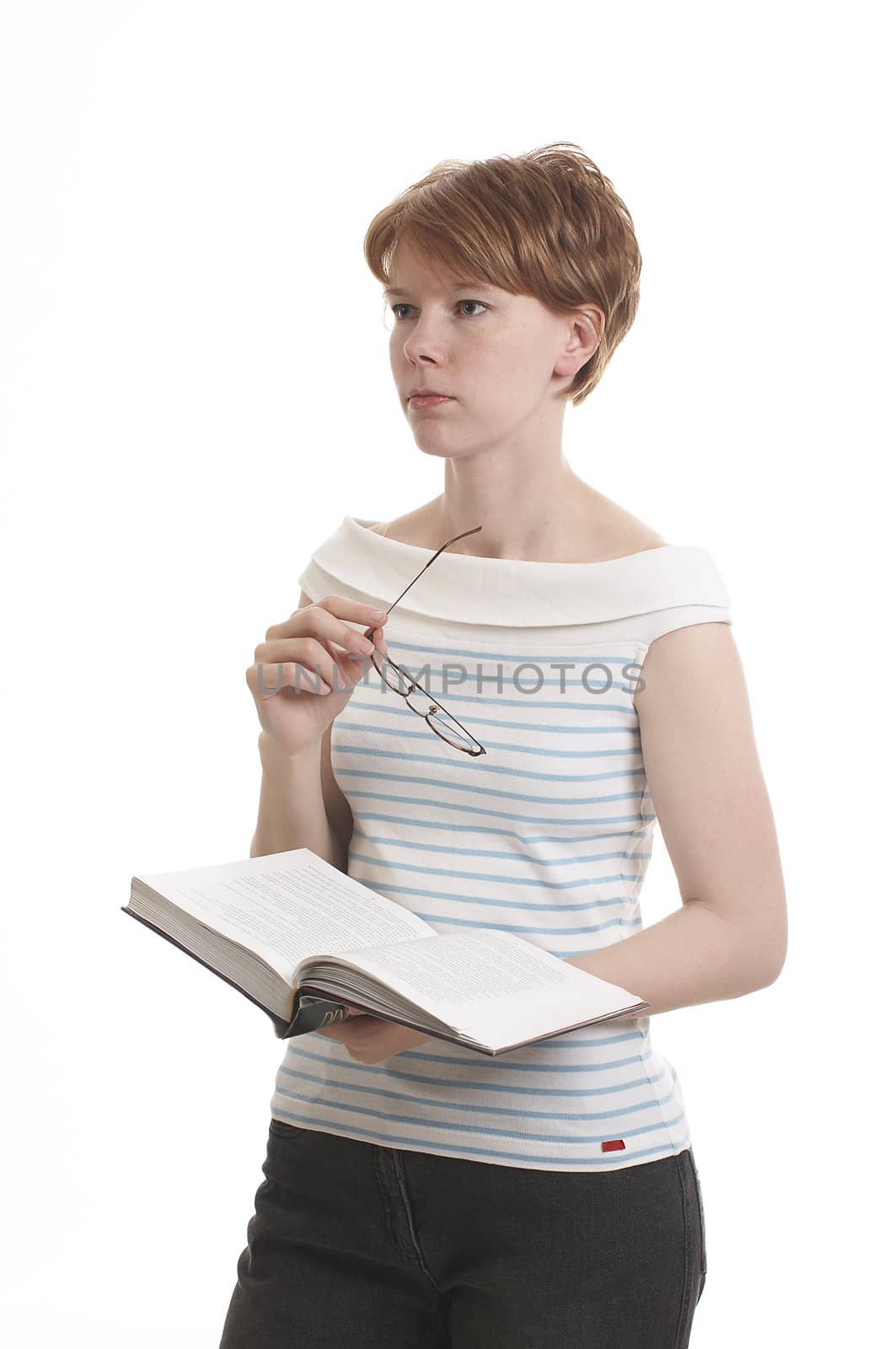 Girl holding the book and thinking