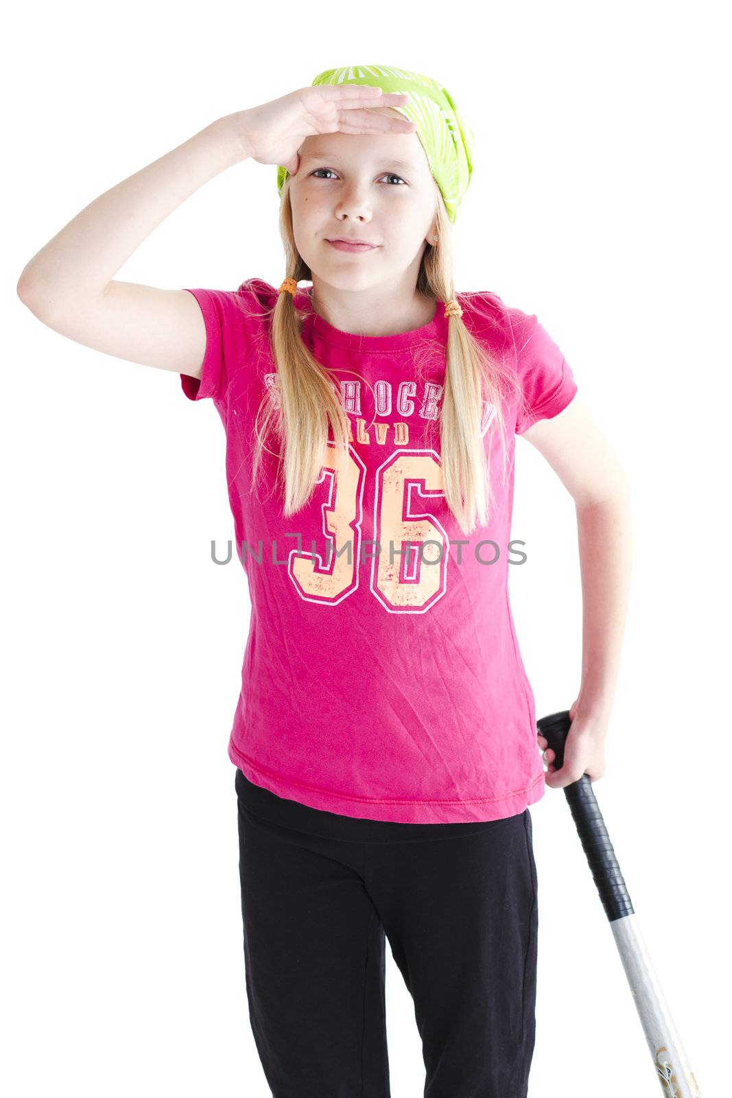 Young softball player looking where the ball is flying